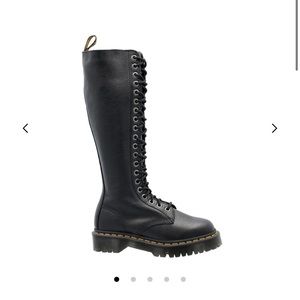 Dr. Martens knee high black leather boots.